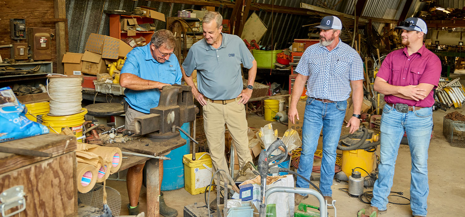 Producer Donald Chase and golden peanut reps on chase farm